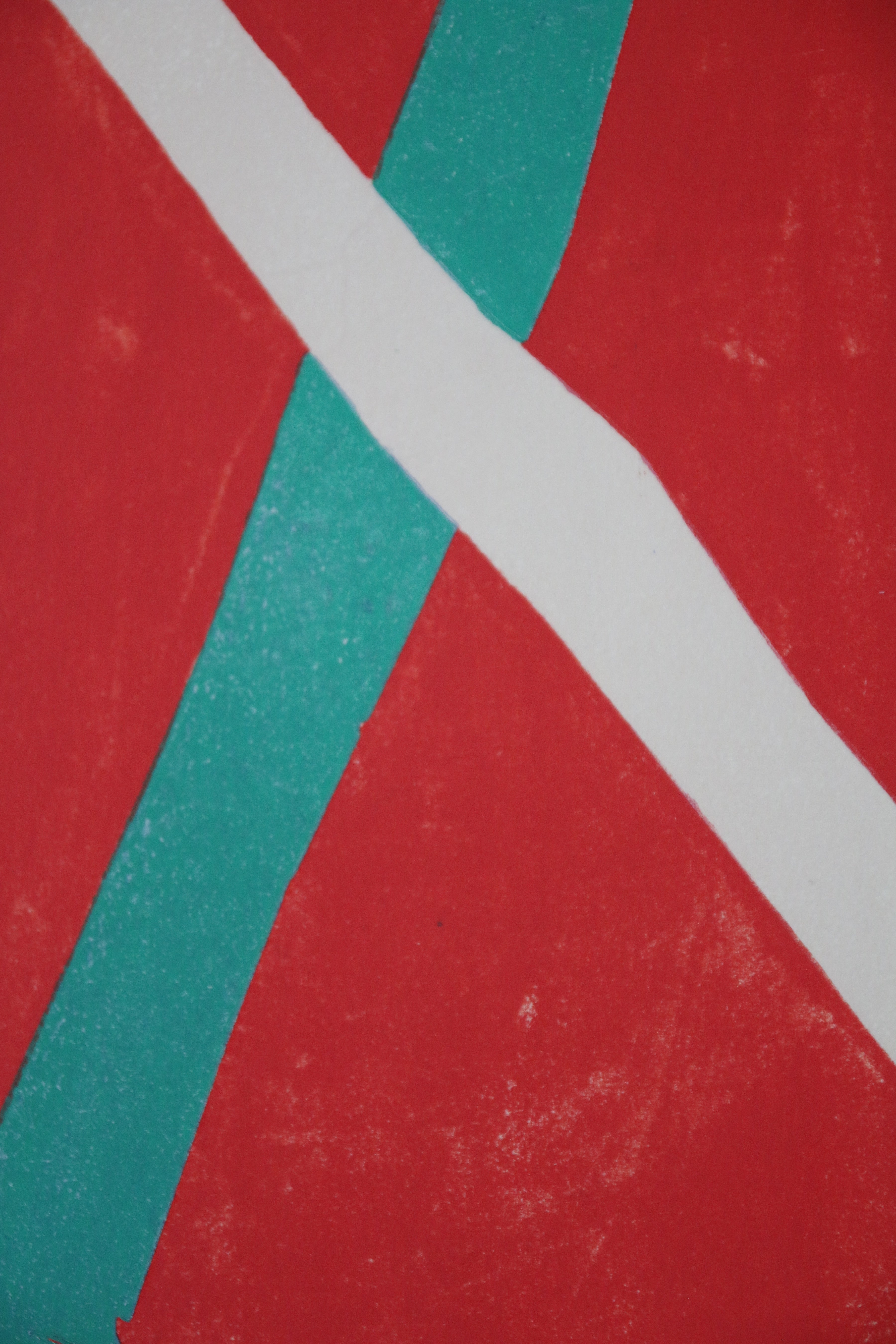 Détail des formes abstraites et des aplats chromatiques rouges de la lithographie d'André Lanskoy.
