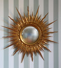 miroir soleil ou sorcière cadre en bois sculpté et doré